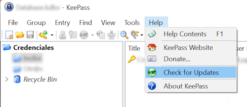 Se muestra la ventana del programa KeePass y donde se muestra el apartado de ayuda, señalando la opción chequear actualizaciones