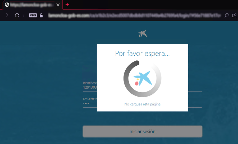 Se muestra una imagen de carga tras introducir las credenciales en el formulario de acceso a CaixaBank.
